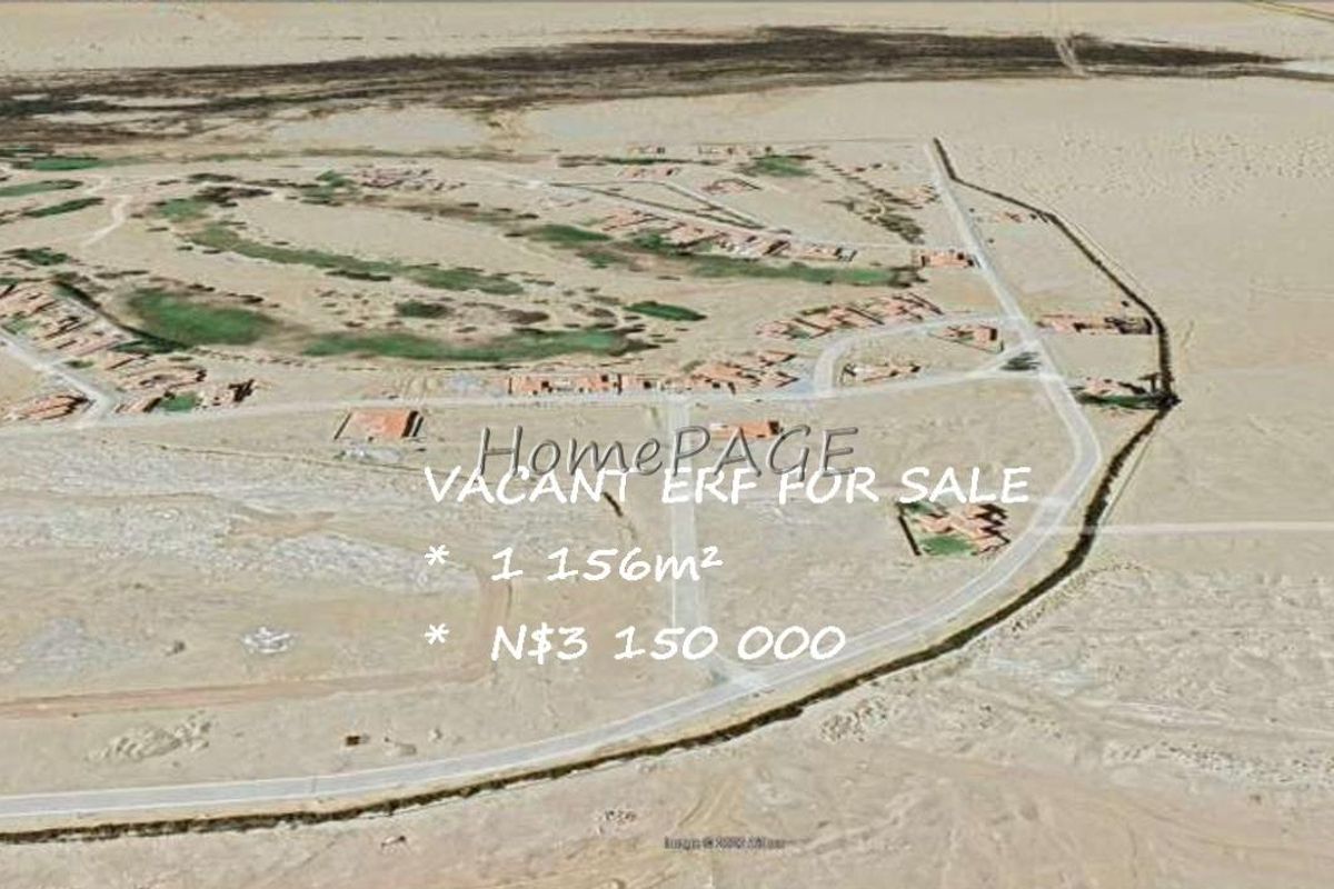 Aerial view of a vacant residential erf located within a developed estate, offering ample space for future construction.