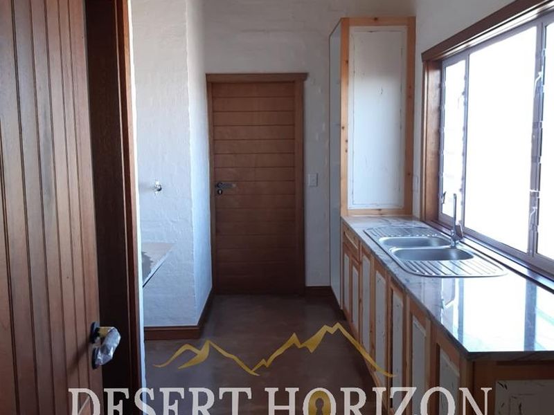 Erongo , Rossmund | Charming Double-Storey Home with Modern Amenities and Scenic Surroundings - Photo 9