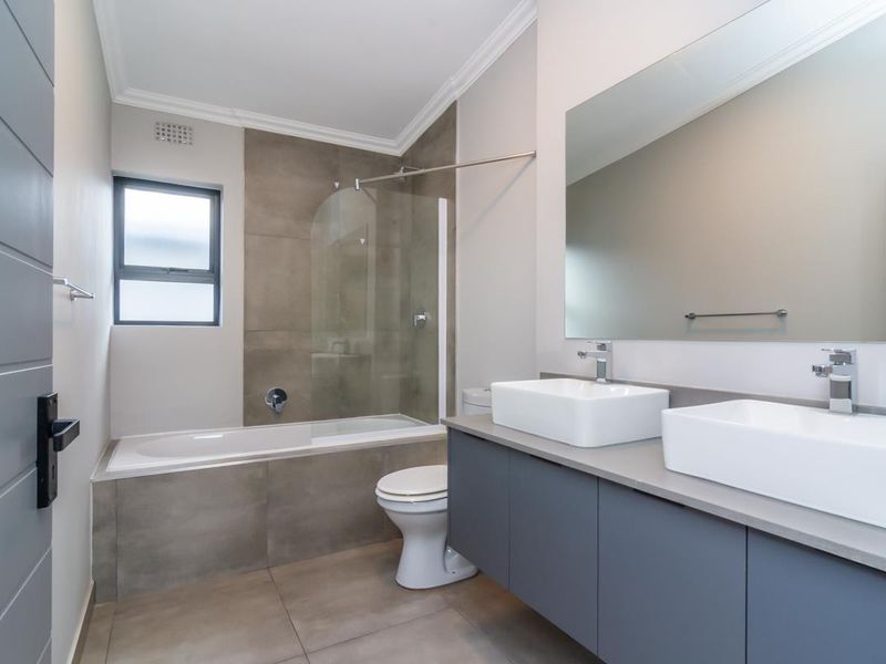 Secure estate living modern three bedroom home with quality finishes - Photo 4