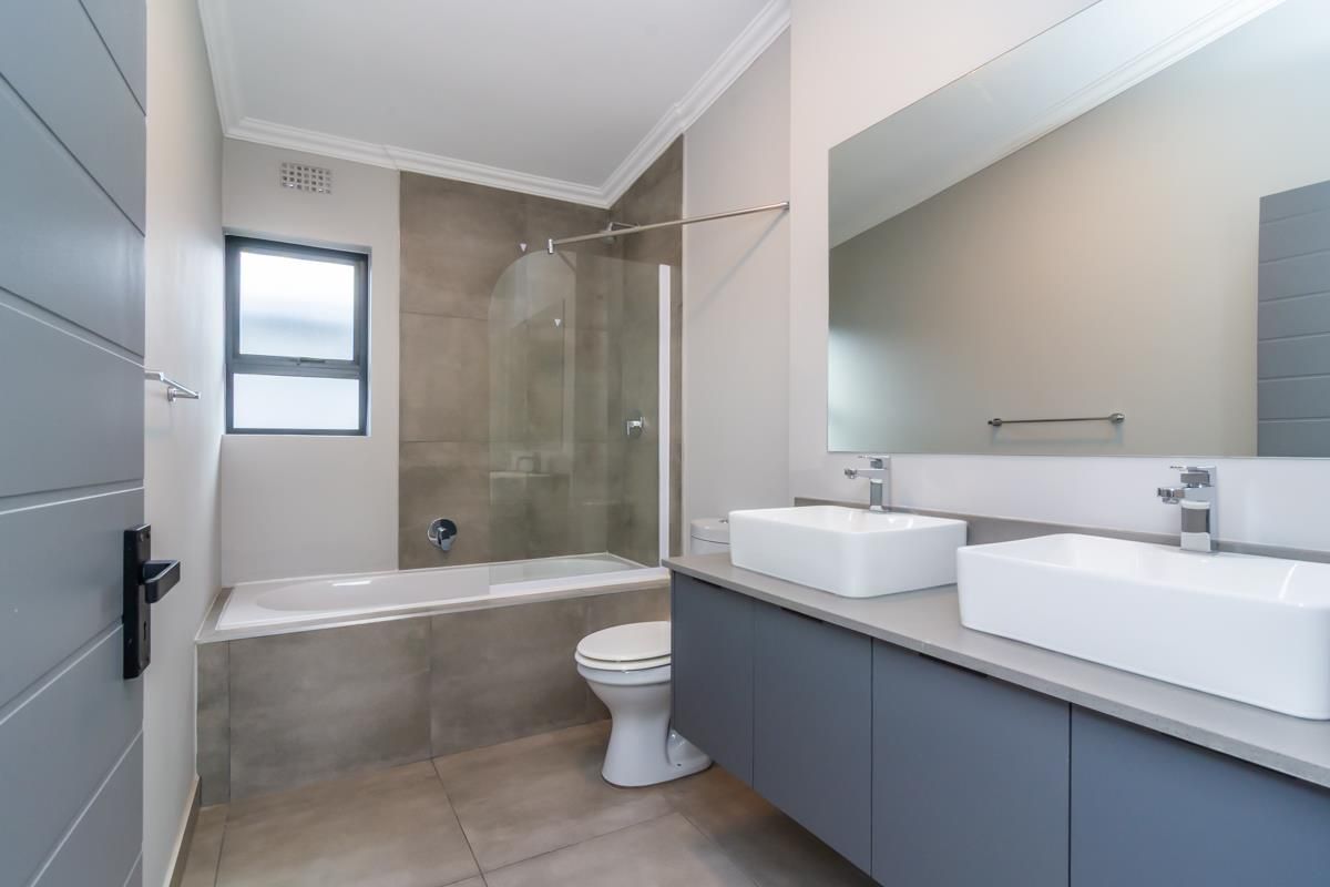 Secure estate living modern three bedroom home with quality finishes - Photo 4