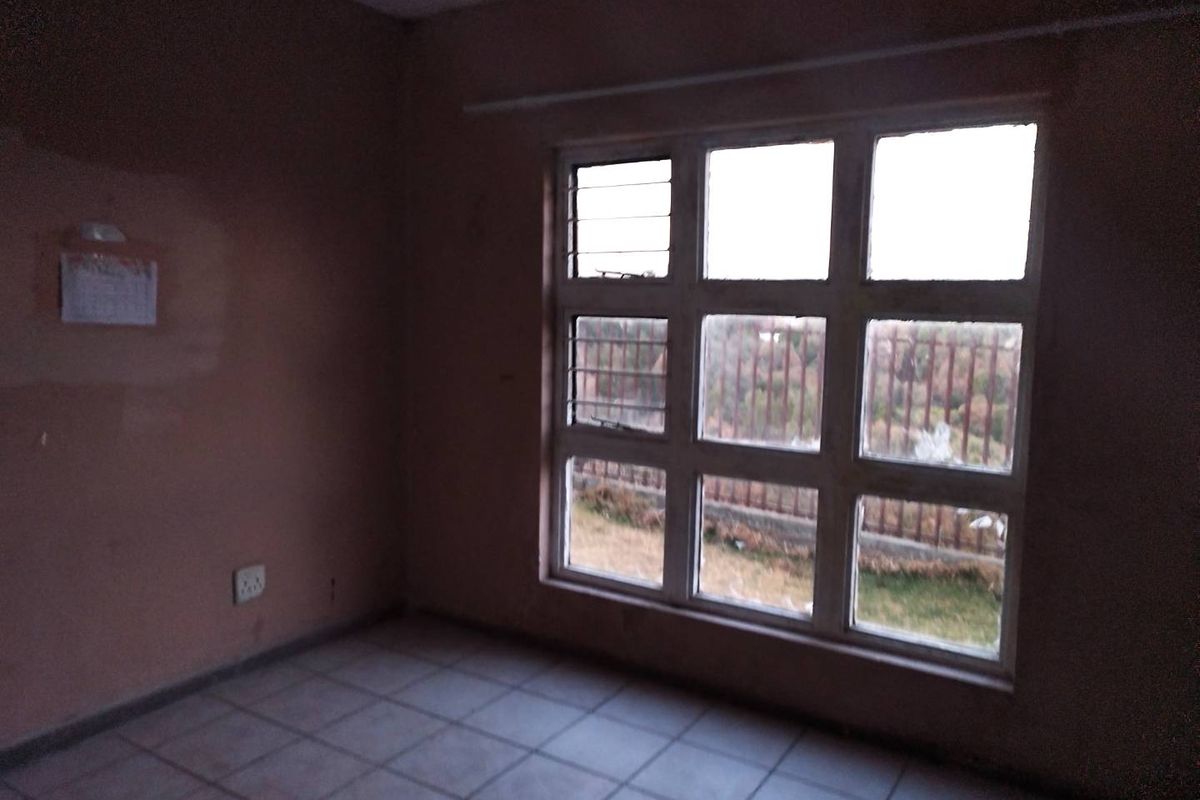 Unlock Potential: Fixer-Upper in Prime Nicolus Estate - Photo 3