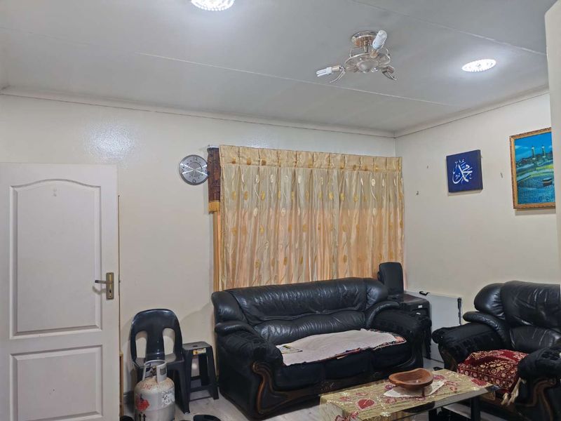 Spacious 4-Bedroom Home with Income-Generating Potential - Photo 5