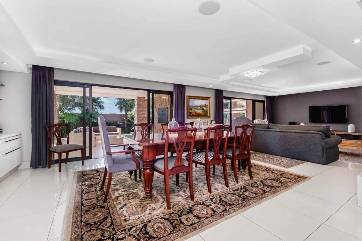 A PRIZED PROPERTY READY FOR ITS NEXT OWNERS BOASTS A FLEXIBLE LAYOUT AND IS TASTEFULLY DESIGNED WITH CAPTIVATING DETAIL - Photo 4