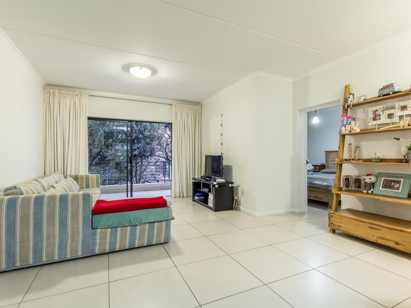 LOCK-UP AND GO LIVING AT ITS FINEST! - Photo 1