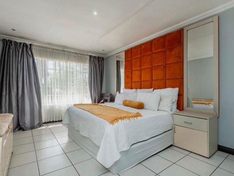 Exceptional 4-Bedroom Family Home with 2 Cottages, Income Potential & Entertainment Paradise for Sale in Germiston - Photo 10