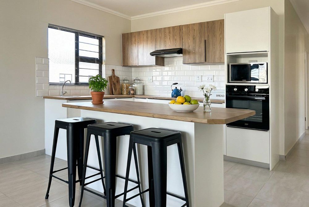 Modern kitchen island with scullery.