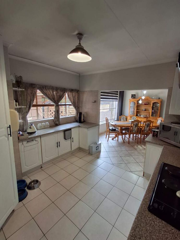 Kitchen leading to Dining Room (Open Plan)