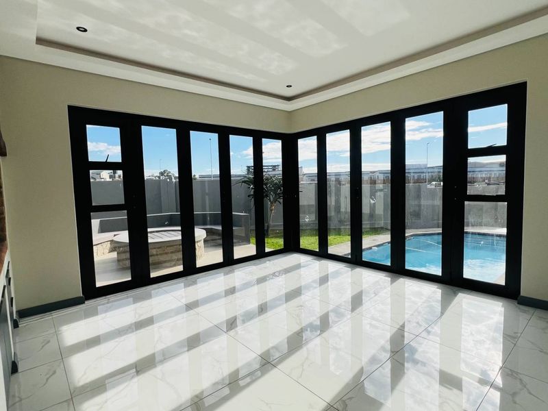 No Transfer Duties- Brand-New Luxury 4 Bedroom Designer Home with Pool, Balconies & Boma – Walk to New Mall Opening Oct 2026 - Photo 3