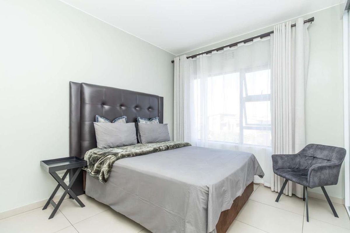 MODERN APARTMENT AWAITS YOU - Photo 5