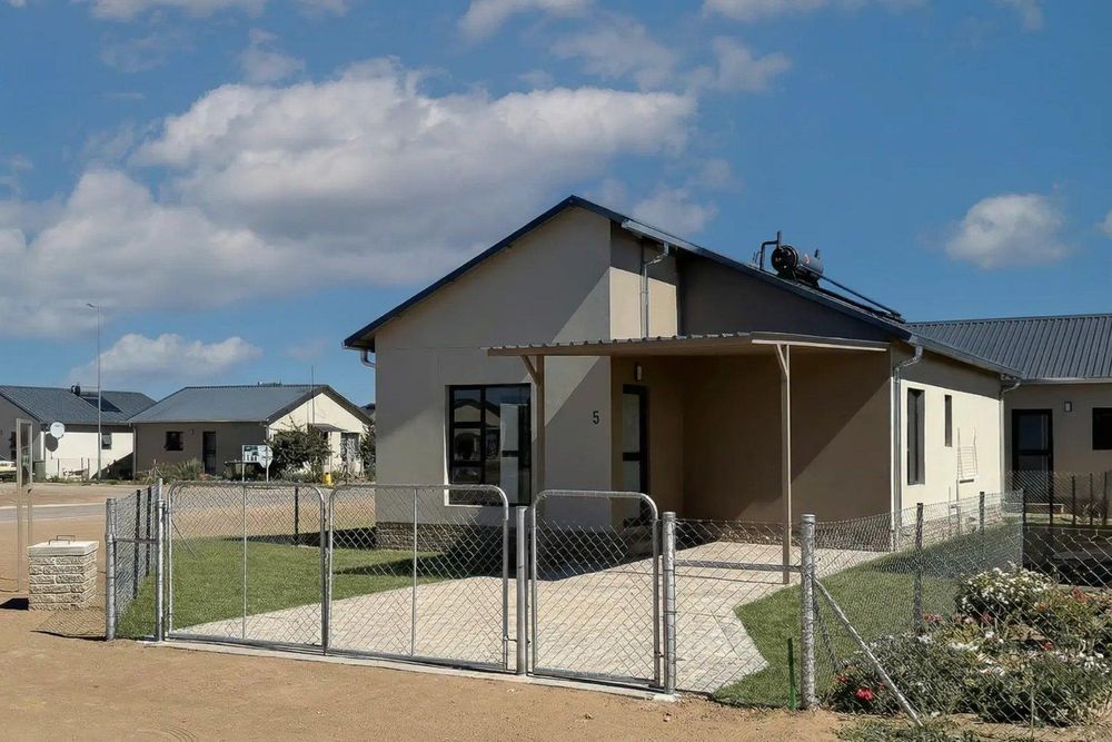 3-Bedroom freestanding townhouse with carport and provision for future expansion.