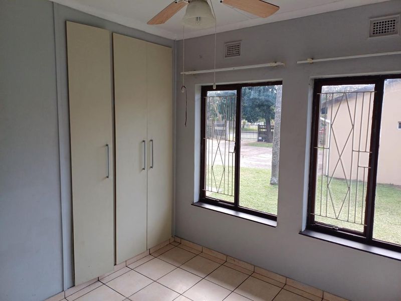 Spacious Family Home with Granny Flat, Pool & Drive-Through Garage in a Pet-Friendly Yard - Photo 5