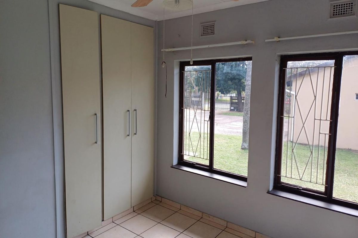 Spacious Family Home with Granny Flat, Pool & Drive-Through Garage in a Pet-Friendly Yard - Photo 5