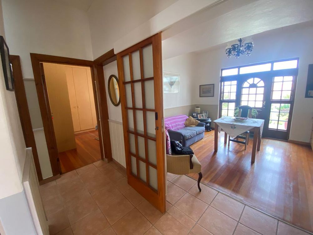 Front entrance and hallway leading to the bedrooms