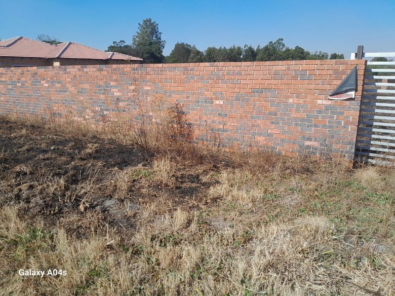 Walled Vacant Stand Inside Boomed Area With a Borehole Dug - Photo 5