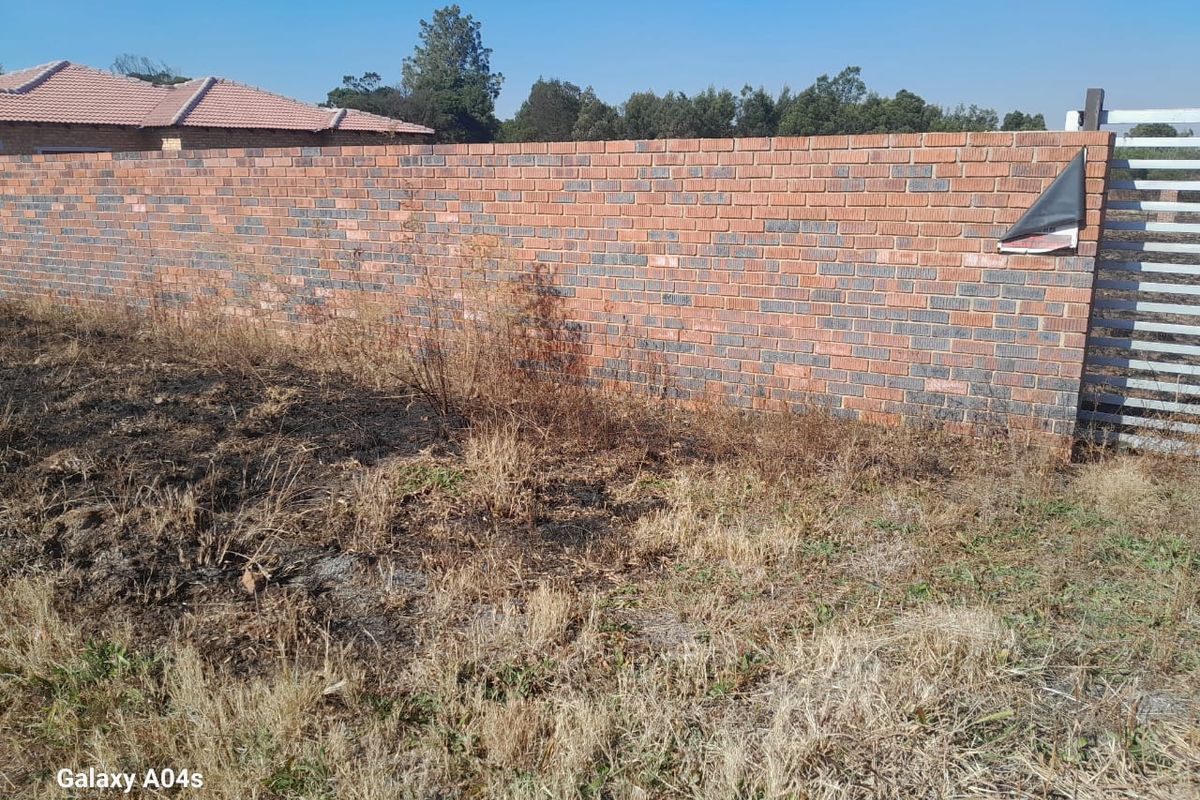 Walled Vacant Stand Inside Boomed Area With a Borehole Dug - Photo 5