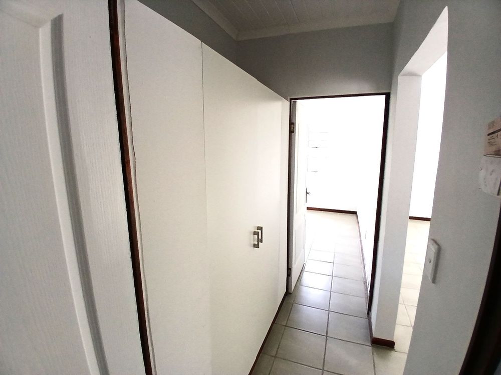 Passage (with lots of built-in cupboards - in between Main Bedroom & 2nd Bedroom.