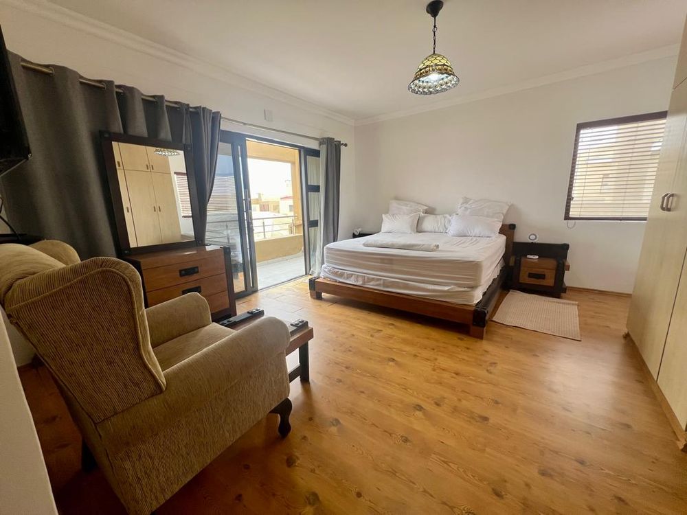 Bedroom 4 (main bedroom) with balcony