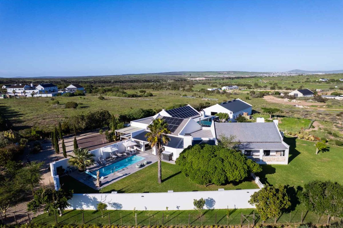A Rare Lifestyle Estate with Three Properties Offering Space, Luxury and Endless Possibilities at Long Acres in the West Coast - Photo 2