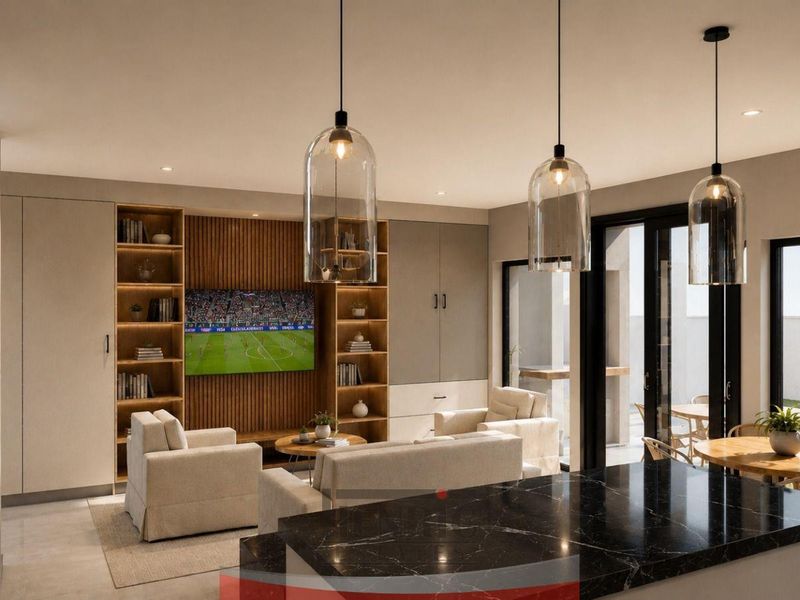 Modern open-plan living area featuring custom built-in cabinetry, slatted timber accents, a sleek black marble kitchen island, and seamless access to the outdoor patio.
