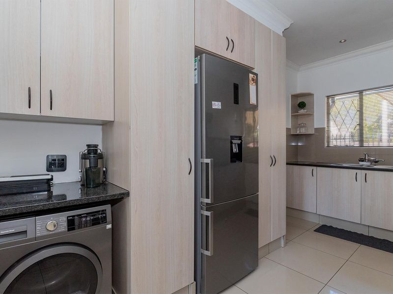 Modern 3-Bedroom Entertainer’s Dream Home with Jacuzzi Room & Heated Pool in Birch Acres - Photo 9