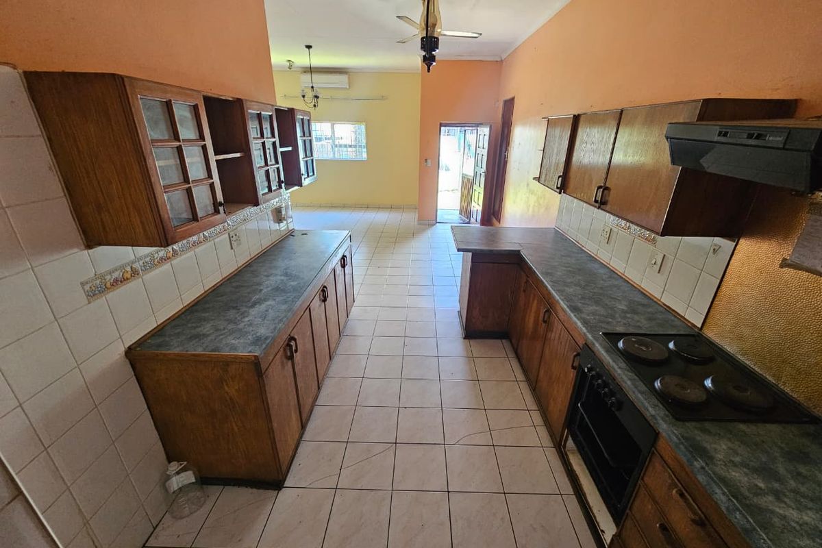 Bargain Fixer-Upper with Bonus Bachelor Flat – A Golden Opportunity! - Photo 2