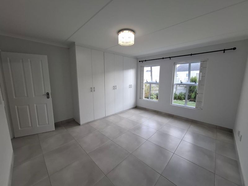 Renovated 2 bedroom apartment with garden - Photo 7