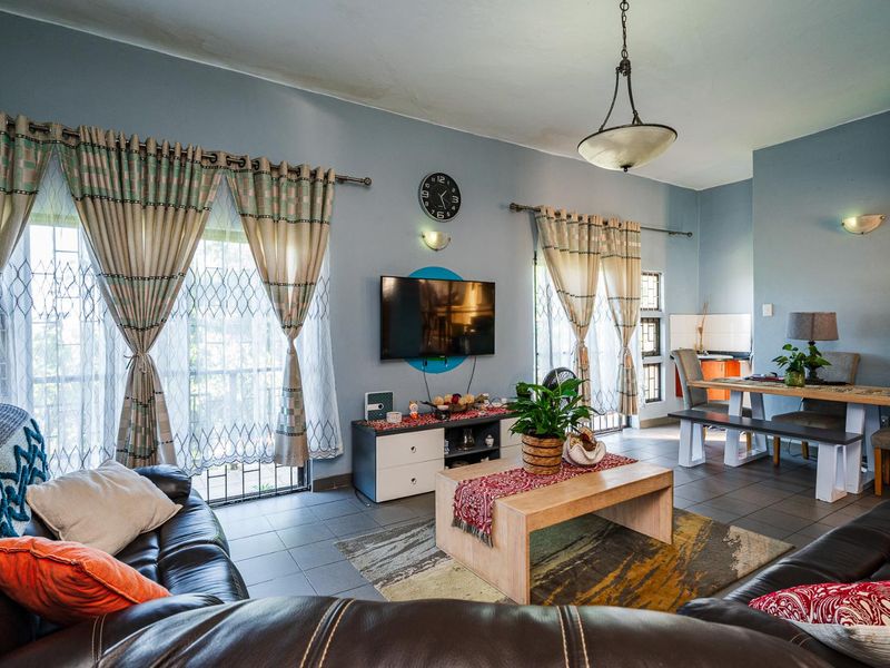 Spacious Hillside Townhouse with Scenic Views & Great Potential - Photo 10