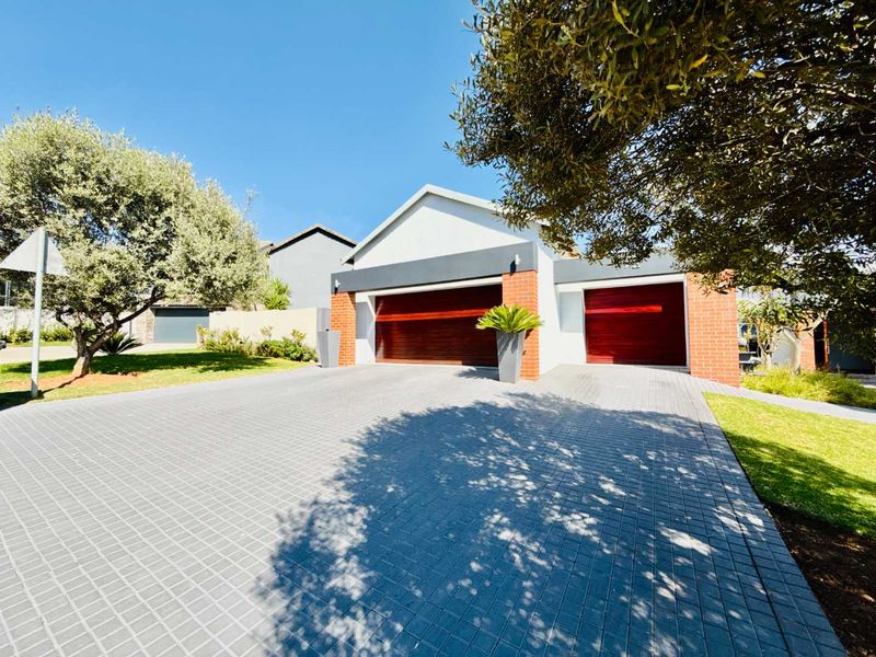 For Rent is a Modern Single-Level Family Home on the Green Belt in Copperleaf Golf Estate - Photo 1