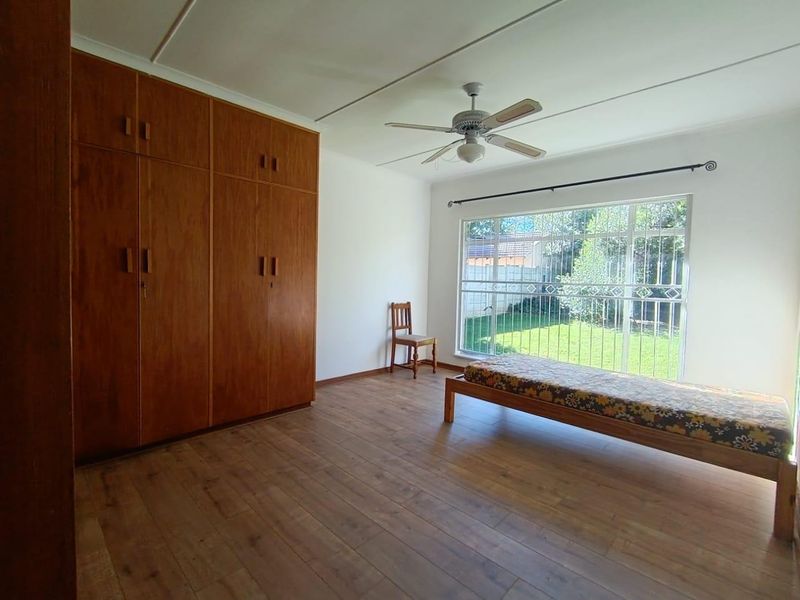 Spacious 5-Bedroom Home with Pool and Versatile Living Options - Photo 10