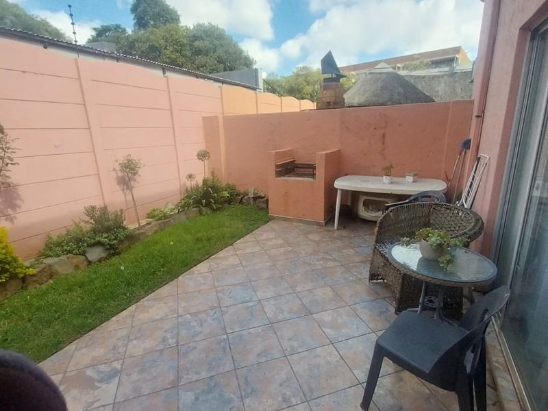 Modern Living Awaits: 2-Bedroom, Balcony, and a Lush Garden! - Photo 7
