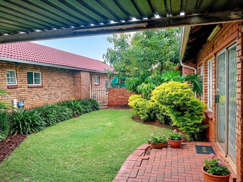 Exceptionally Secure Two-Bedroom Townhouse with Private Garden Retreat - Photo 3