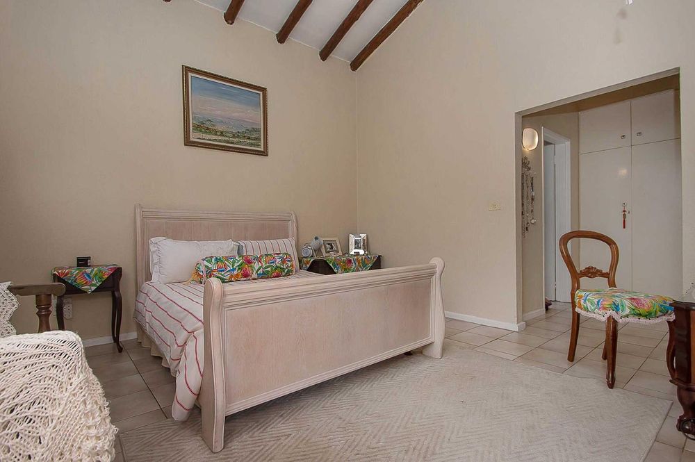 Background showing walk in cupboard space and en-suite entrance