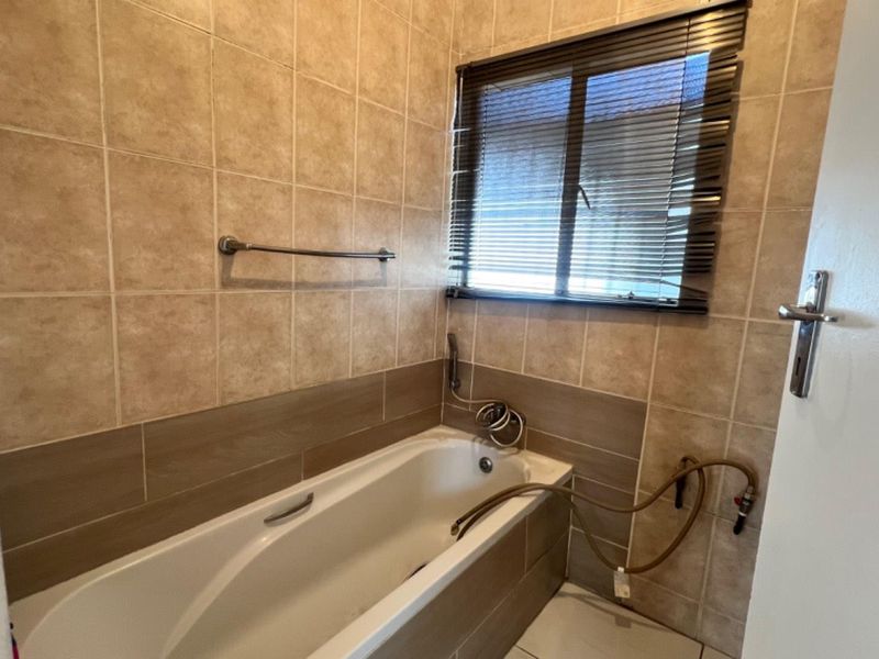 Cook, Relax, and Feel Safe in This Stunning 2-Bedroom Home - Photo 6