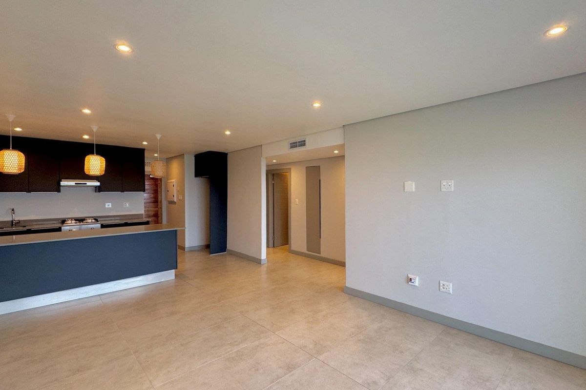 This brand-new, never-before-lived-in apartment offers a refined coastal lifestyle with breathtaking panoramic sea views and sleek, modern finishes throughout - Photo 4