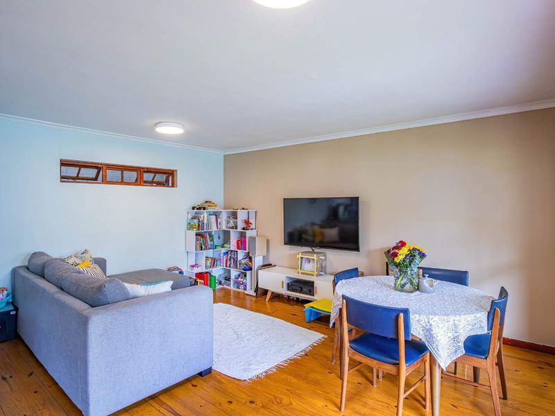 Charming North-Facing Double-Storey Home with Sunny Garden & Pool - Photo 7