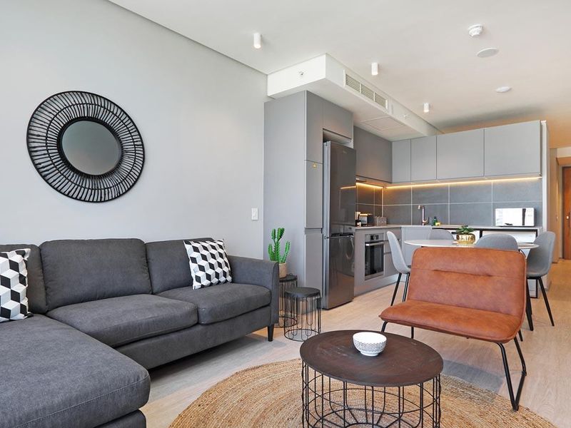 Experience City Living with a Serene Mountain Backdrop - Photo 7