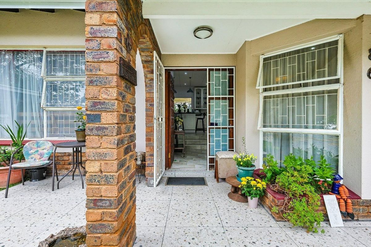 Family Home with Flatlet, Solar Power, and Pool in Sought-After Rooihuiskraal - Photo 5