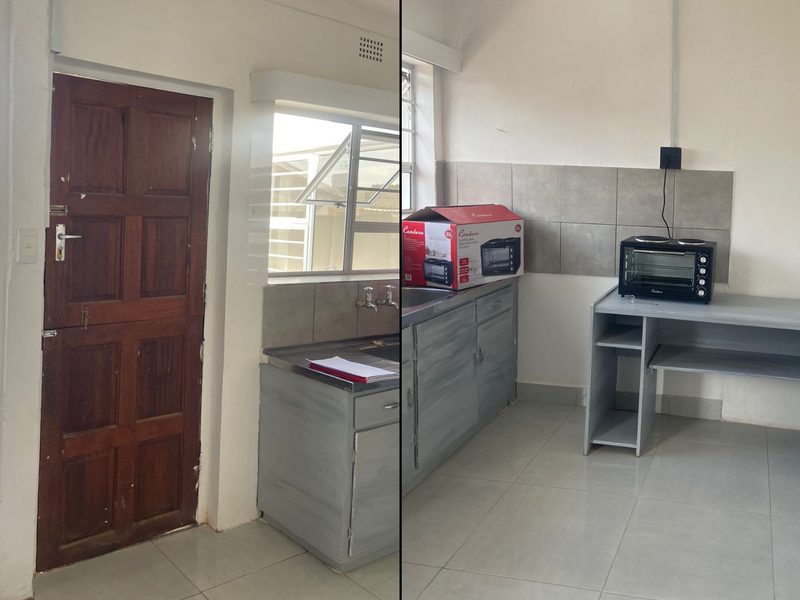A compact kitchen area featuring tiled flooring, a tiled splashback, built-in cabinetry, and a sink, presented in a basic, functional condition.