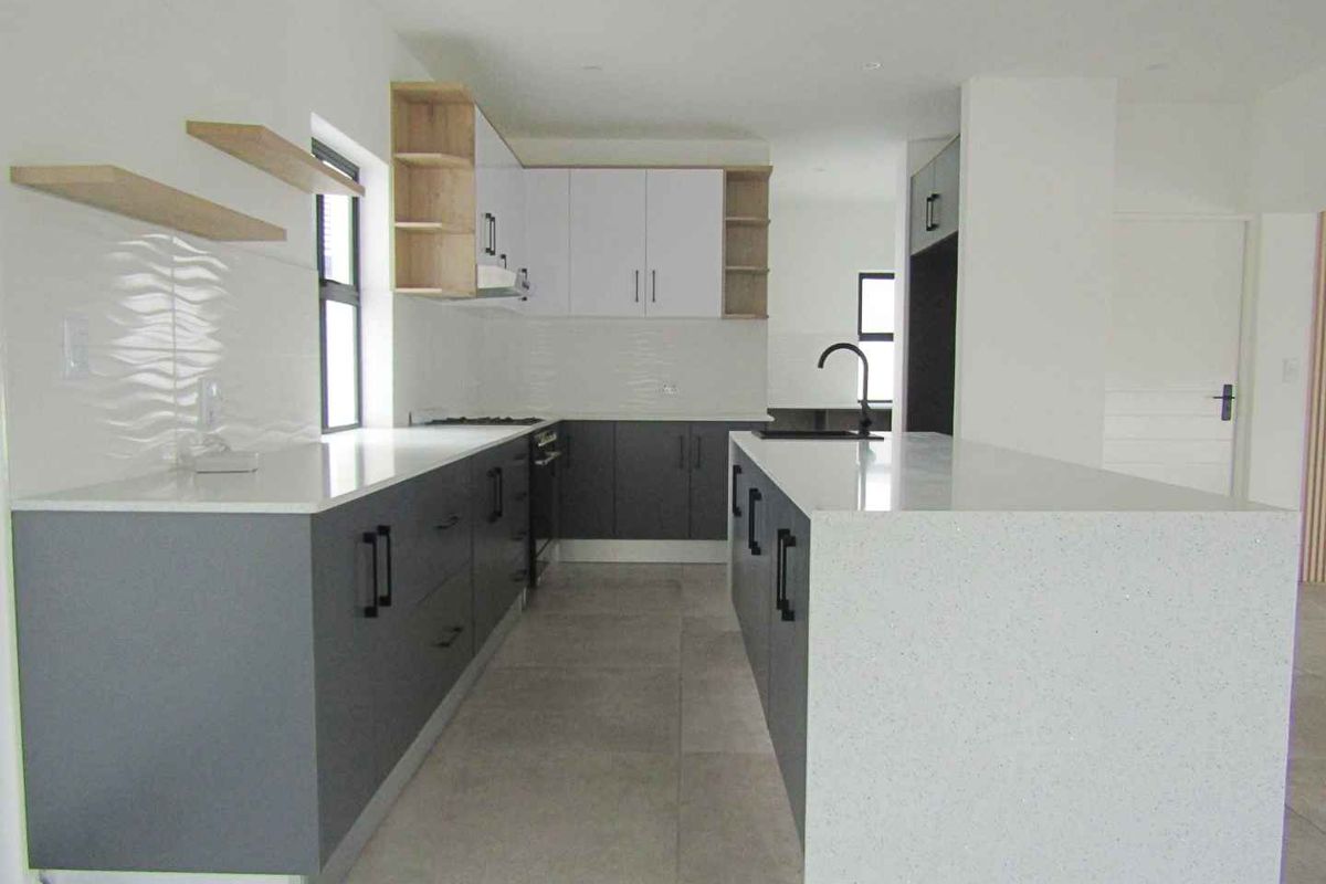 Costal three bedroom home with modern finishes - Photo 5