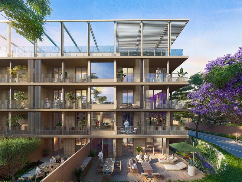 A modern penthouse apartment building featuring multiple levels of private balconies, a rooftop terrace structure, and a landscaped ground-level patio area.