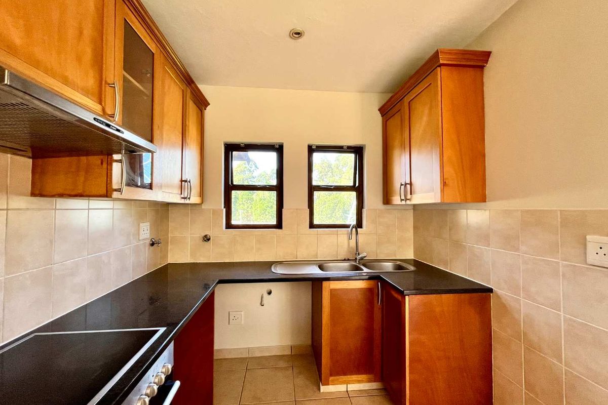 Charming 2-Bed Townhouse in Sought-After Plantations Estate - Photo 4