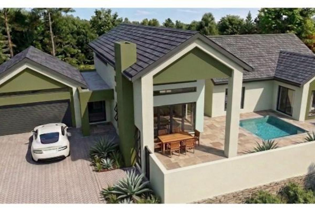 Aerial view of a modern residential property featuring a tiled roof, swimming pool, covered patio, and paved driveway within a landscaped setting.