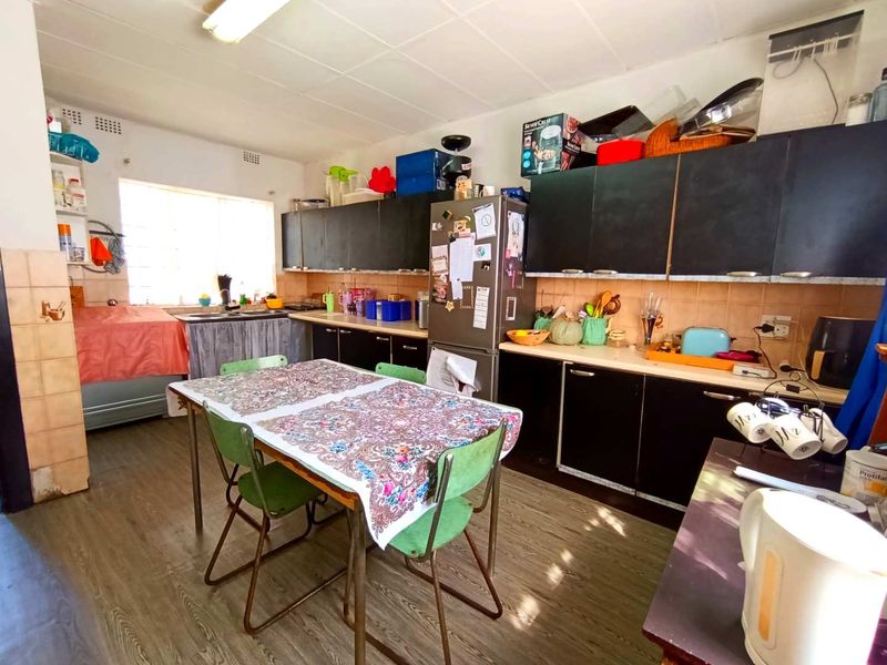 Neat 3-Bedroom Home with Income-Generating Cottage - Photo 8