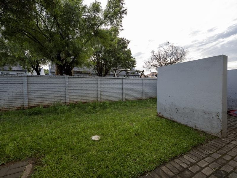 SECURE LIVING WITH POTENTIAL: 2-BEDROOM HOME WITH CHARM - Photo 6