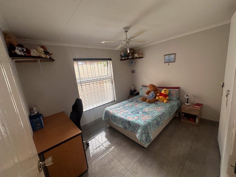 Modern 2-Bedroom Townhouse with Patio and Private Courtyard in Rangeview in Cosmos Complex - Photo 6