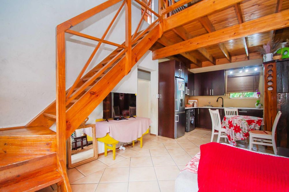 Upstairs opens onto additional loft