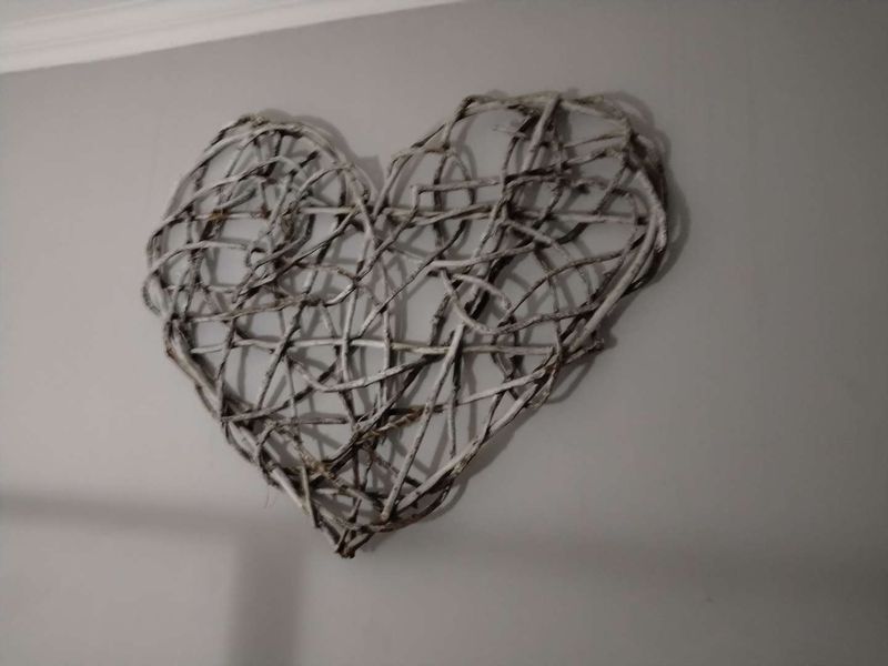 A close-up view of a decorative wall hanging.