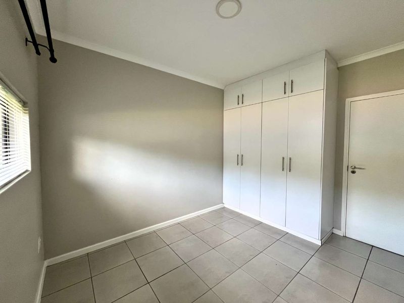 Stylish 1-Bed Garden Apartment in Sought-After The Woods Estate - Photo 8