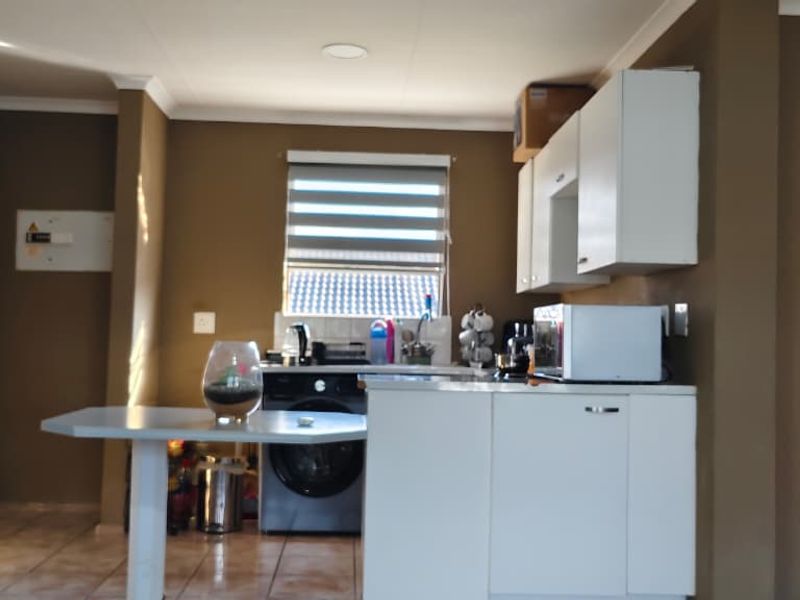 Modern Living Awaits in Serene Suburb! - Photo 3