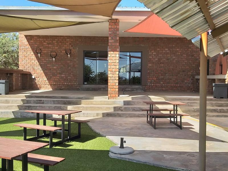 FOR SALE- BEAUTIFUL SMALL HOLDING IN BRAKWATER, WINDHOEK, NAMIBIA.(HAS GREAT POTENTIAL TO APPLY FOR B&B AND DAY TO DAY ACCOMMODATION) - Photo 8